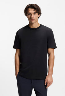 Front image of a model wearing the Tee 5 t-shirt in navy, by brand Boss