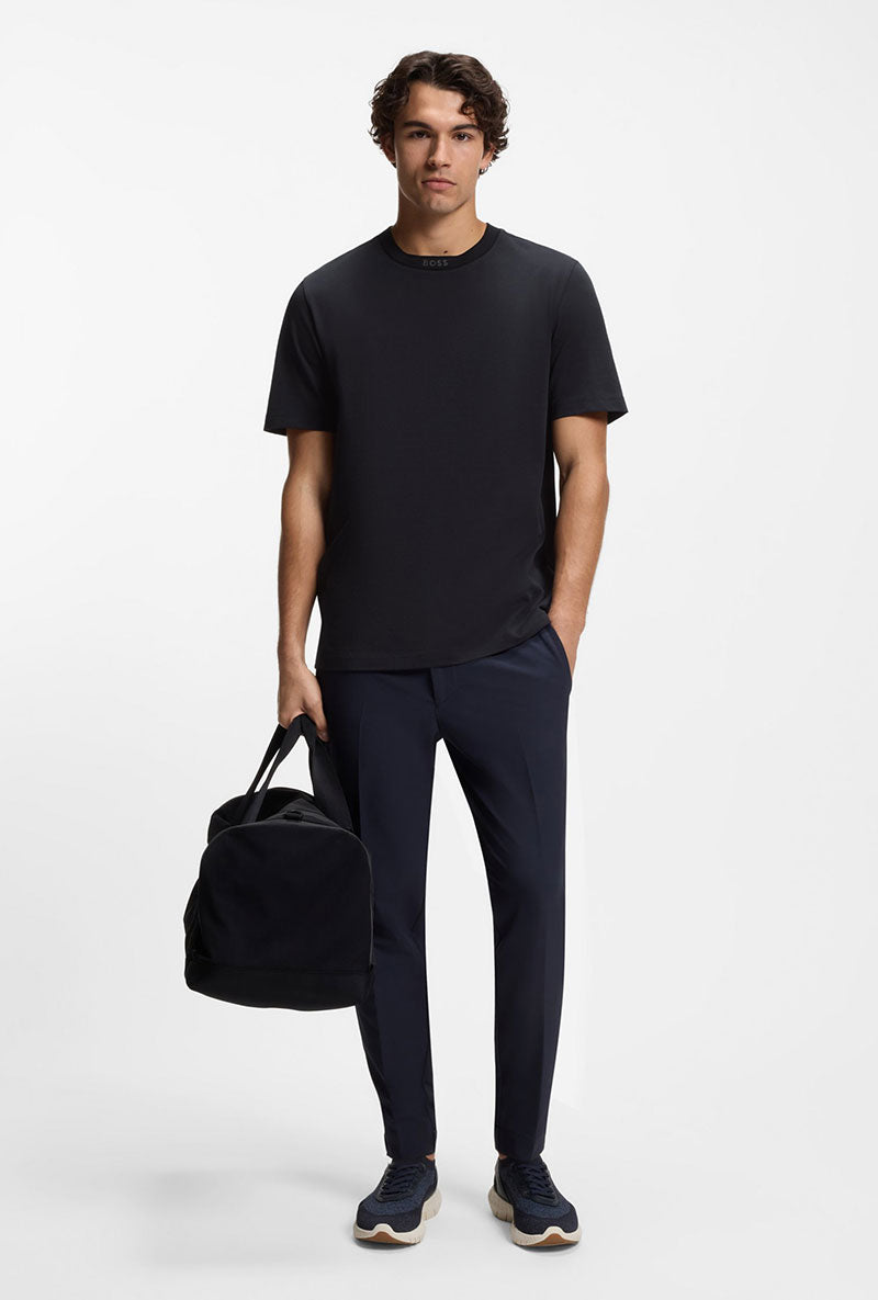 Front image of a model wearing Tee 5 t-shirt in navy, by brand Boss