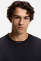 Front image of a model wearing the Tee 5 t-shirt in navy, by brand Boss