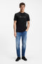 Front image of a model wearing the Tegood t-shirt in black, by brand Boss