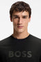 Front image of a model wearing the Tegood t-shirt in black, by brand Boss