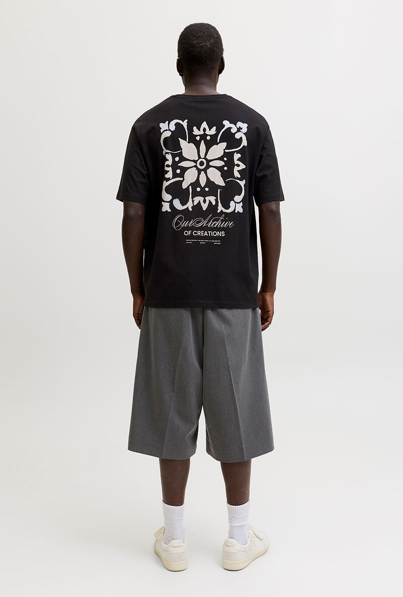Back image of a model wearing Art print tee in black, by brand Jack&jones