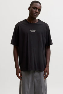 Front image of a model wearing the Art print tee in black, by brand Jack&jones