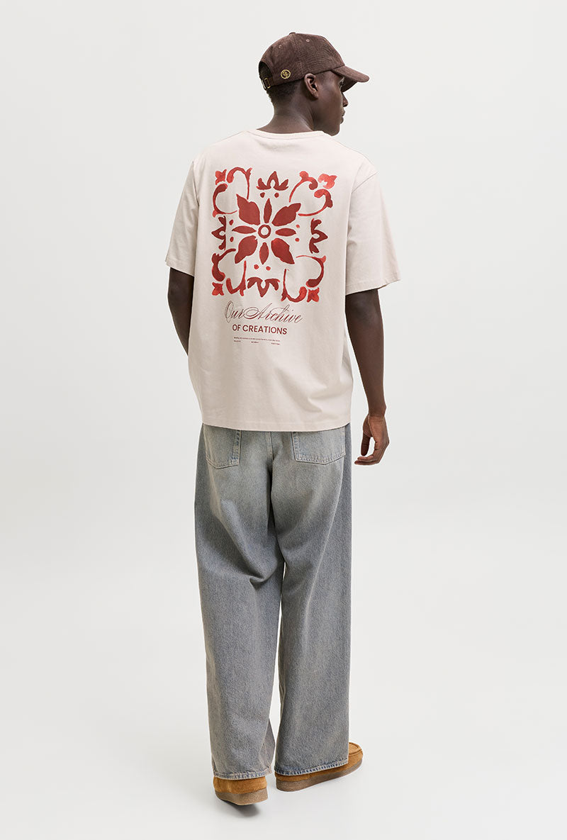 Back image of a model wearing Art print tee in beige, by brand Jack&jones