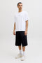 Front image of a model wearing the Art print tee in white, by brand Jack&jones