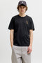 Front image of a model wearing Brewy ss tee in black, by brand Jack&jones