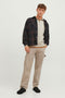 Front image of a model wearing the Bradley sweat half zip sweatshirt in beige, by brand Jack&jones