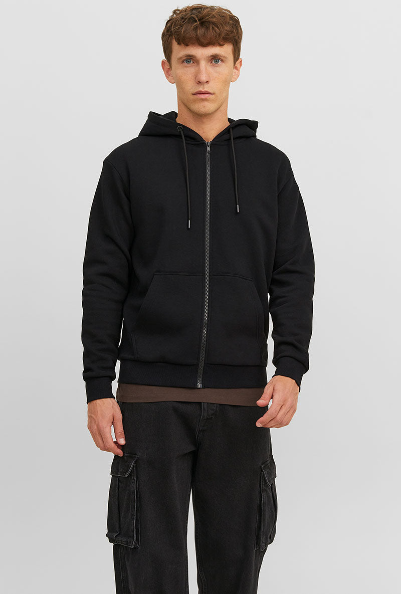 Front image of a model wearing Bradley sweat zip hood in black, by brand Jack&jones