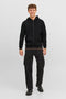 Front image of a model wearing the Bradley sweat zip hood in black, by brand Jack&jones