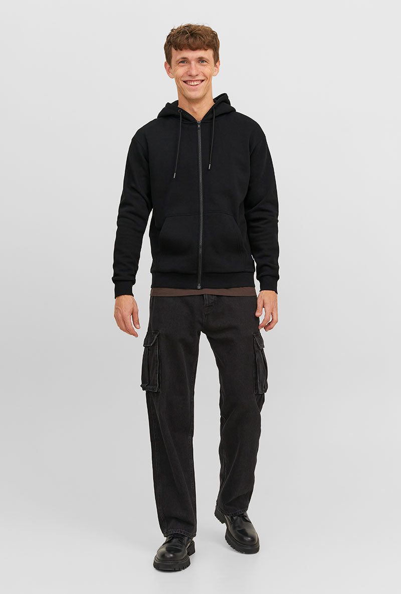 Front image of a model wearing Bradley sweat zip hood in black, by brand Jack&jones