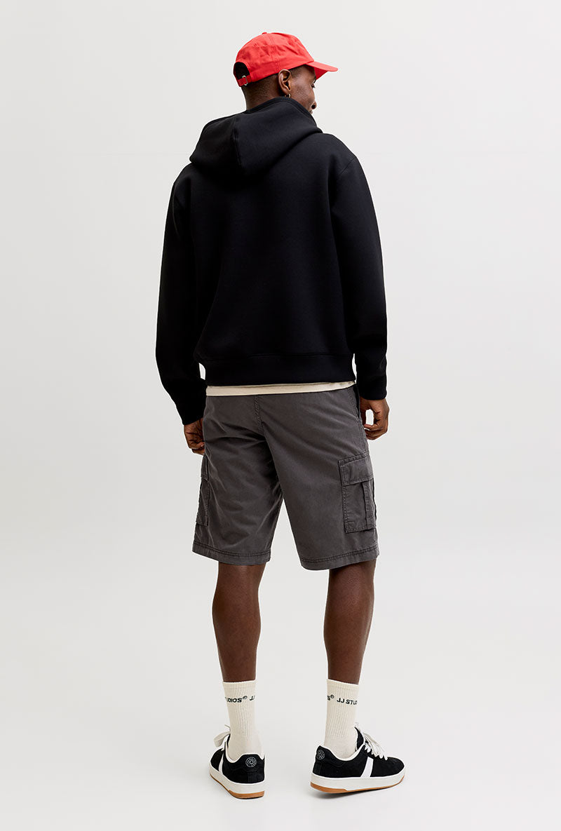 Back image of a model wearing Cole matty cargo shorts in charcoal, by brand Jack&jones