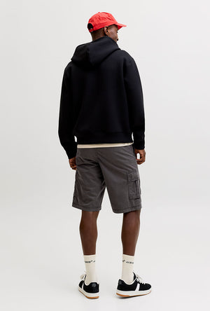 Back image of a model wearing the Cole matty cargo shorts in charcoal, by brand Jack&jones