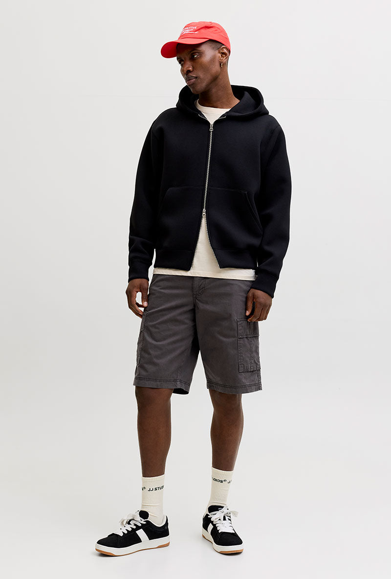 Front image of a model wearing Cole matty cargo shorts in charcoal, by brand Jack&jones