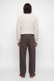 Back image of a model wearing the Connor crew neck knit in beige, by brand Jack&jones