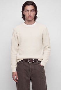 Front image of a model wearing the Connor crew neck knit in beige, by brand Jack&jones