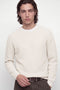 Front image of a model wearing the Connor crew neck knit in beige, by brand Jack&jones
