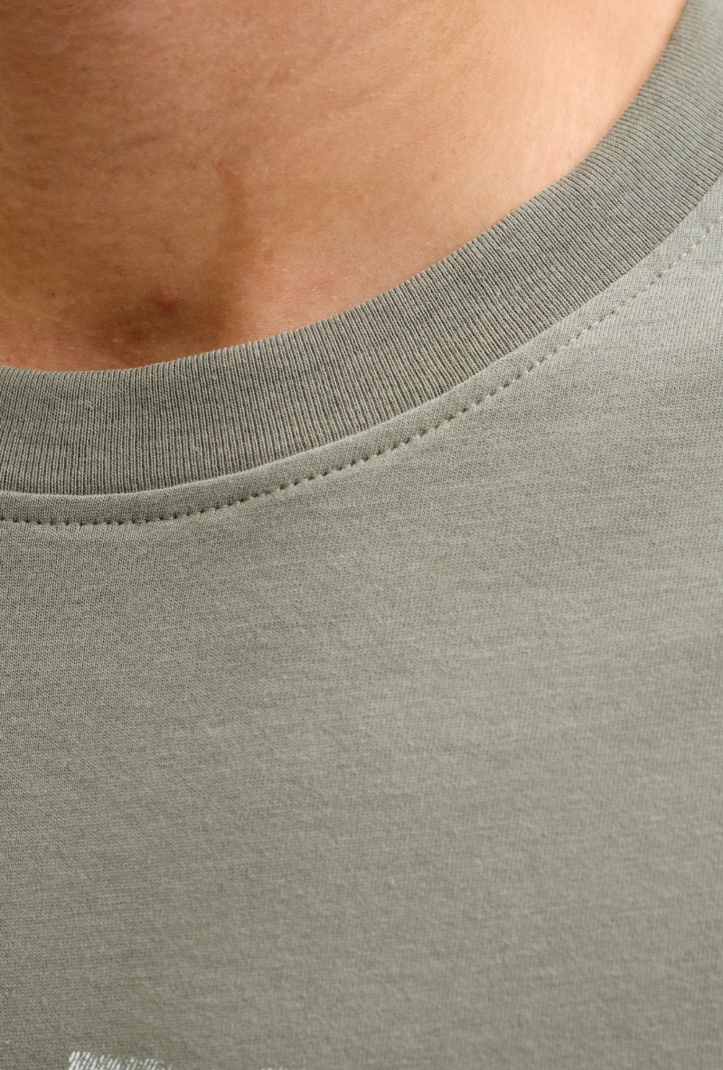 Close up image  of Jack and jones daytona print tee in khaki, by brand Jack&jones