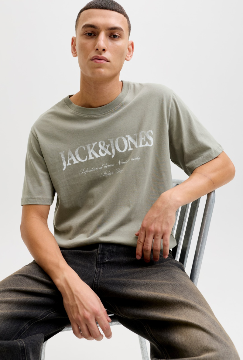Front image of a model wearing Jack and jones daytona print tee in khaki, by brand Jack&jones
