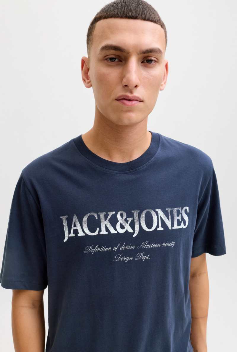 Front image of a model wearing Jack and jones daytona print tee in navy, by brand Jack&jones