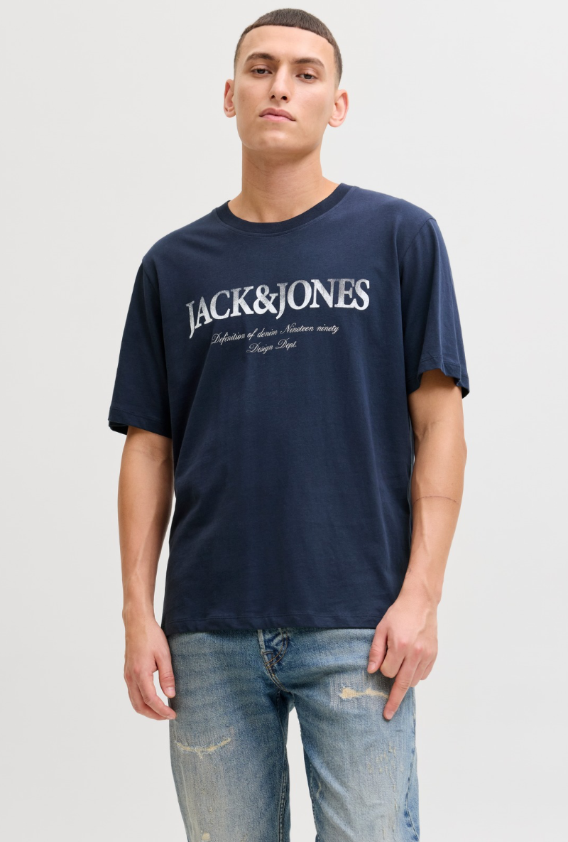 Front image of a model wearing Jack and jones daytona print tee in navy, by brand Jack&jones