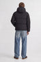 Back image of a model wearing the Galaxy puffer jacket in black, by brand Jack&jones