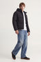 Front image of a model wearing the Galaxy puffer jacket in black, by brand Jack&jones