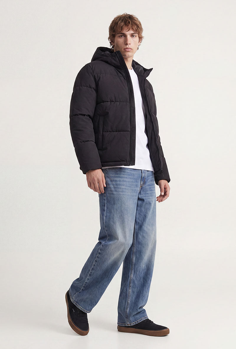 Front image of a model wearing Galaxy puffer jacket in black, by brand Jack&jones