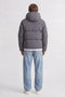 Back image of a model wearing the Galaxy puffer jacket in charcoal, by brand Jack&jones