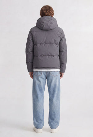 Back image of a model wearing the Galaxy puffer jacket in charcoal, by brand Jack&jones