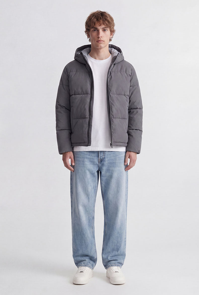 Front image of a model wearing Galaxy puffer jacket in charcoal, by brand Jack&jones