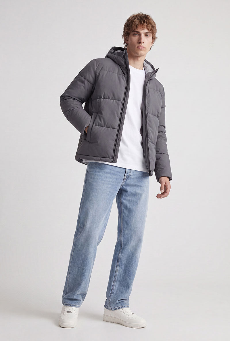 Front image of a model wearing Galaxy puffer jacket in charcoal, by brand Jack&jones