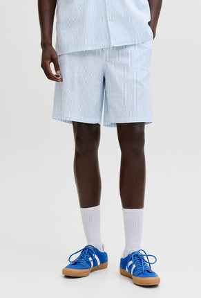Front image of a model wearing Jaiden milo seersucker shorts in light blue, by brand Jack&jones