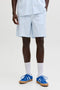 Front image of a model wearing Jaiden milo seersucker shorts in light blue, by brand Jack&jones