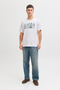 Front image of a model wearing Jack and jones jeff logo tee in white, by brand Jack&jones