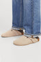 Front image of a model wearing the Louis suede mule in beige, by brand Jack&jones