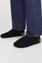 Front image of a model wearing the Louis suede mule in black, by brand Jack&jones