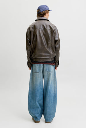 Back image of a model wearing the Marlon pu jacket in brown, by brand Jack&jones
