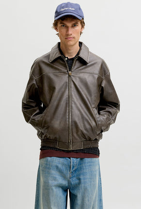 Front image of a model wearing Marlon pu jacket in brown, by brand Jack&jones