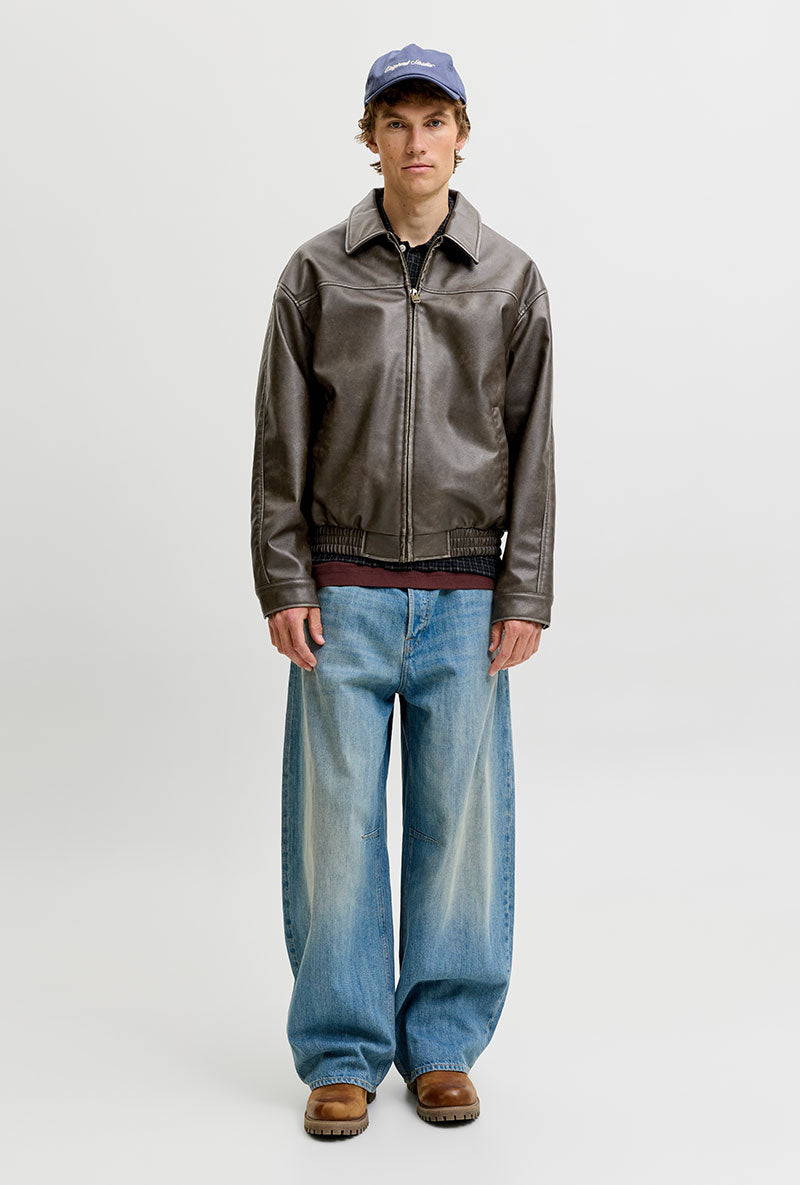 Front image of a model wearing Marlon pu jacket in brown, by brand Jack&jones