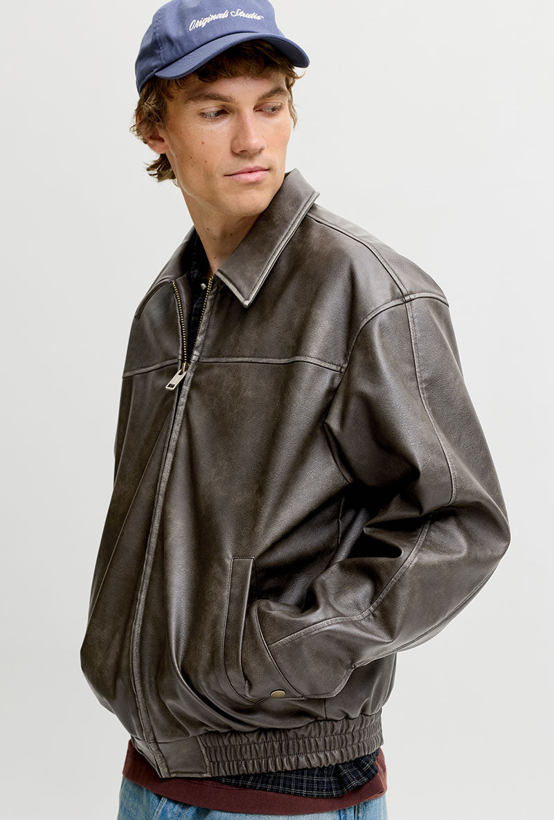 Front image of a model wearing Marlon pu jacket in brown, by brand Jack&jones