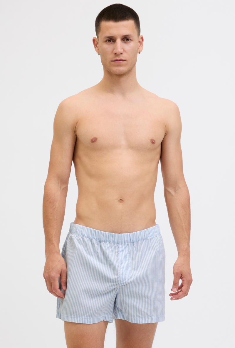 Front image of model wearing Jack and jones milano woven 3 pk trunks in light blue, by brand Jack&jones