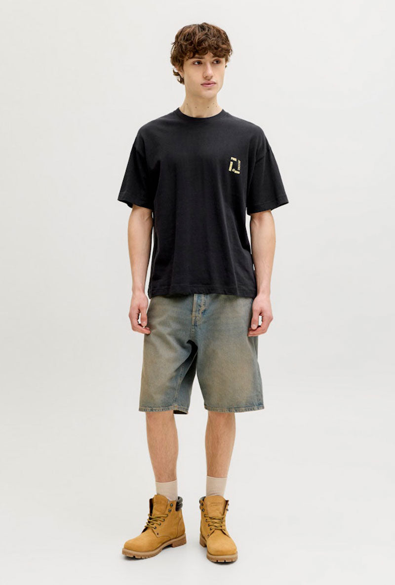 Front image of a model wearing Montauk back graphic tee in black, by brand Jack&jones