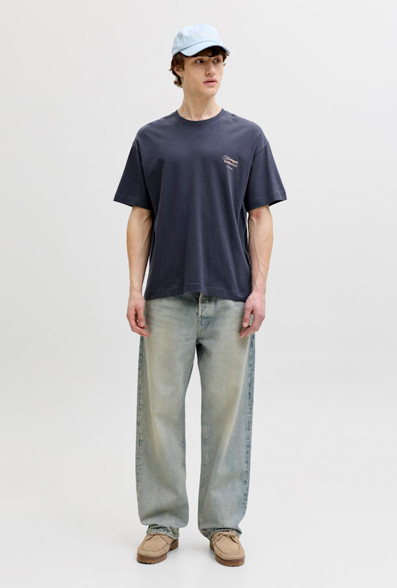 Front image of a model wearing Montauk back graphic tee in charcoal, by brand Jack&jones