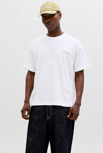 Front image of a model wearing the Montauk back graphic tee in white, by brand Jack&jones