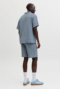 Back image of a model wearing the Nantucket double cloth ss shirt in blue, by brand Jack&jones