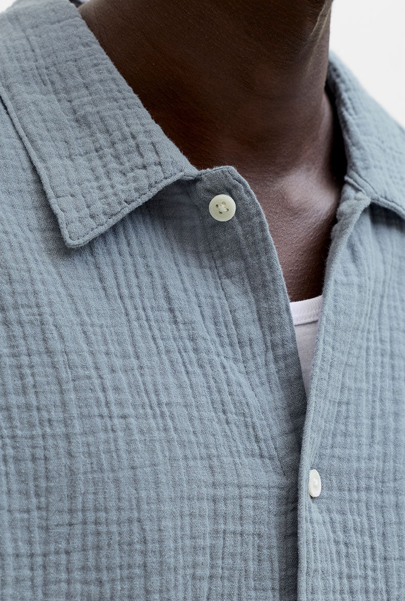 Front detail image of a model wearing Nantucket double cloth ss shirt in blue, by brand Jack&jones