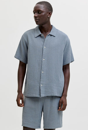 Front image of a model wearing the Nantucket double cloth ss shirt in blue, by brand Jack&jones