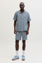 Front image of a model wearing the Nantucket double cloth ss shirt in blue, by brand Jack&jones