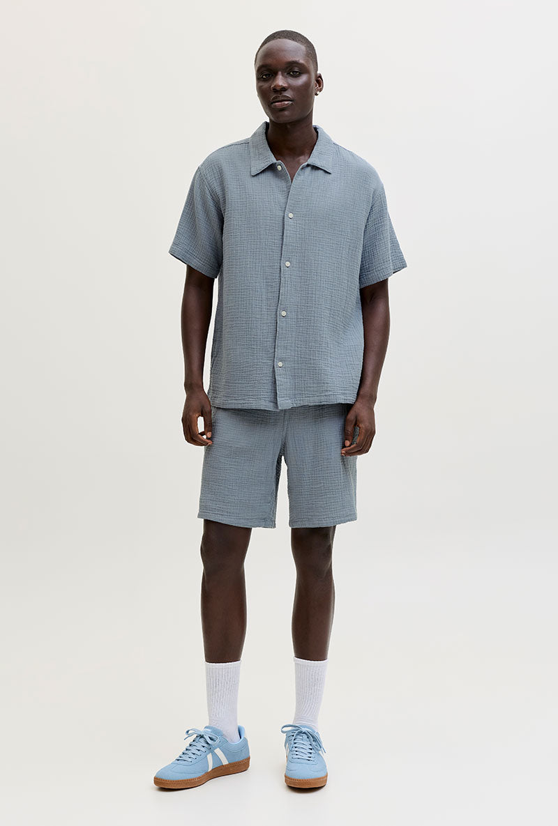 Front image of a model wearing Nantucket double cloth ss shirt in blue, by brand Jack&jones