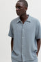 Front image of a model wearing the Nantucket double cloth ss shirt in blue, by brand Jack&jones